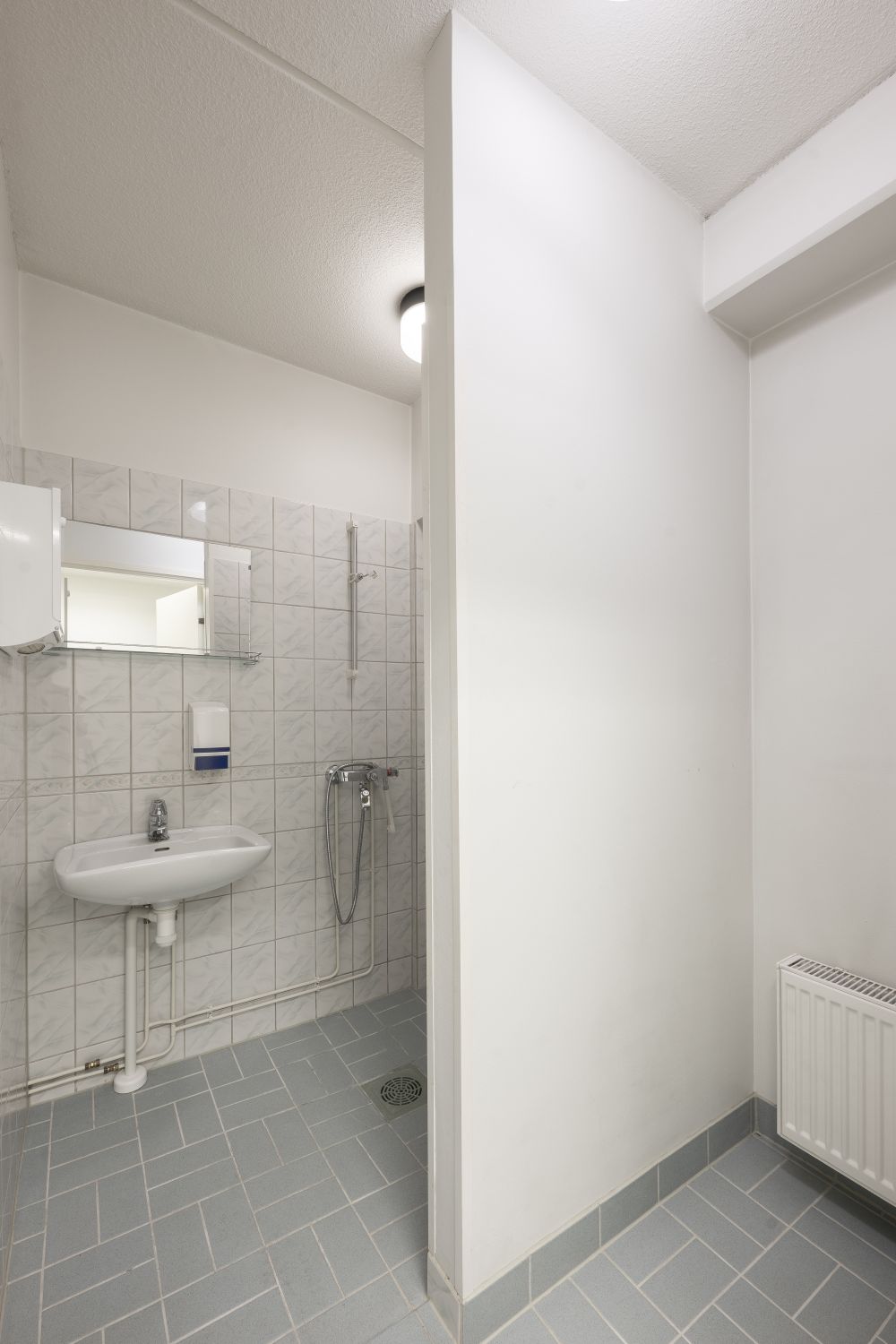 Yhteiskäyttöinen suihku