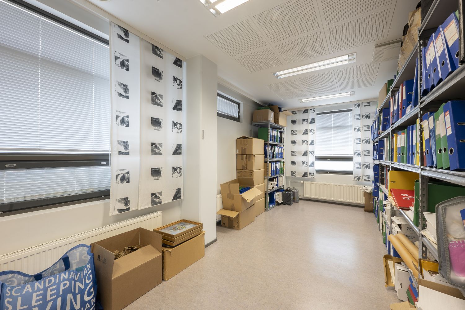 Monikäyttöinen arkistotila sopii vaikka kuntoilutilaksi